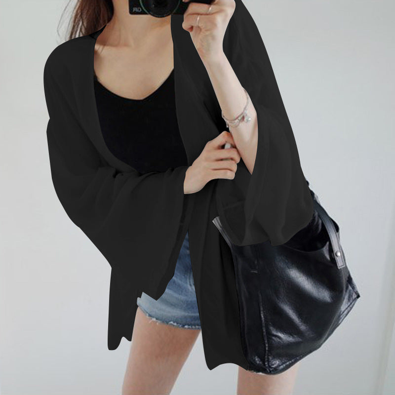 Elegant Kimono Jacket with Loose Fit and Detailed Sleeves