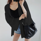 Elegant Kimono Jacket with Loose Fit and Detailed Sleeves