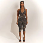 Women's Bodycon Jumpsuit with Snake Print and Deep Neckline