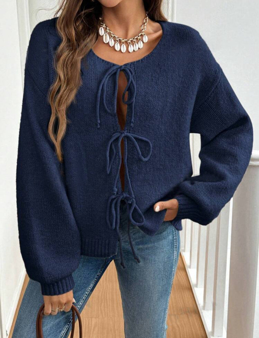 Women's Cozy Knit Sweater with Decorative Lace-Up Detail and Wide Sleeves