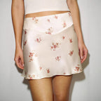 Women's Short Satin Skirt with Floral Design and Flowing Silhouette