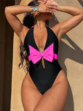 Women's Swimsuit with Refined Cut-Out and Feminine Bow Accents