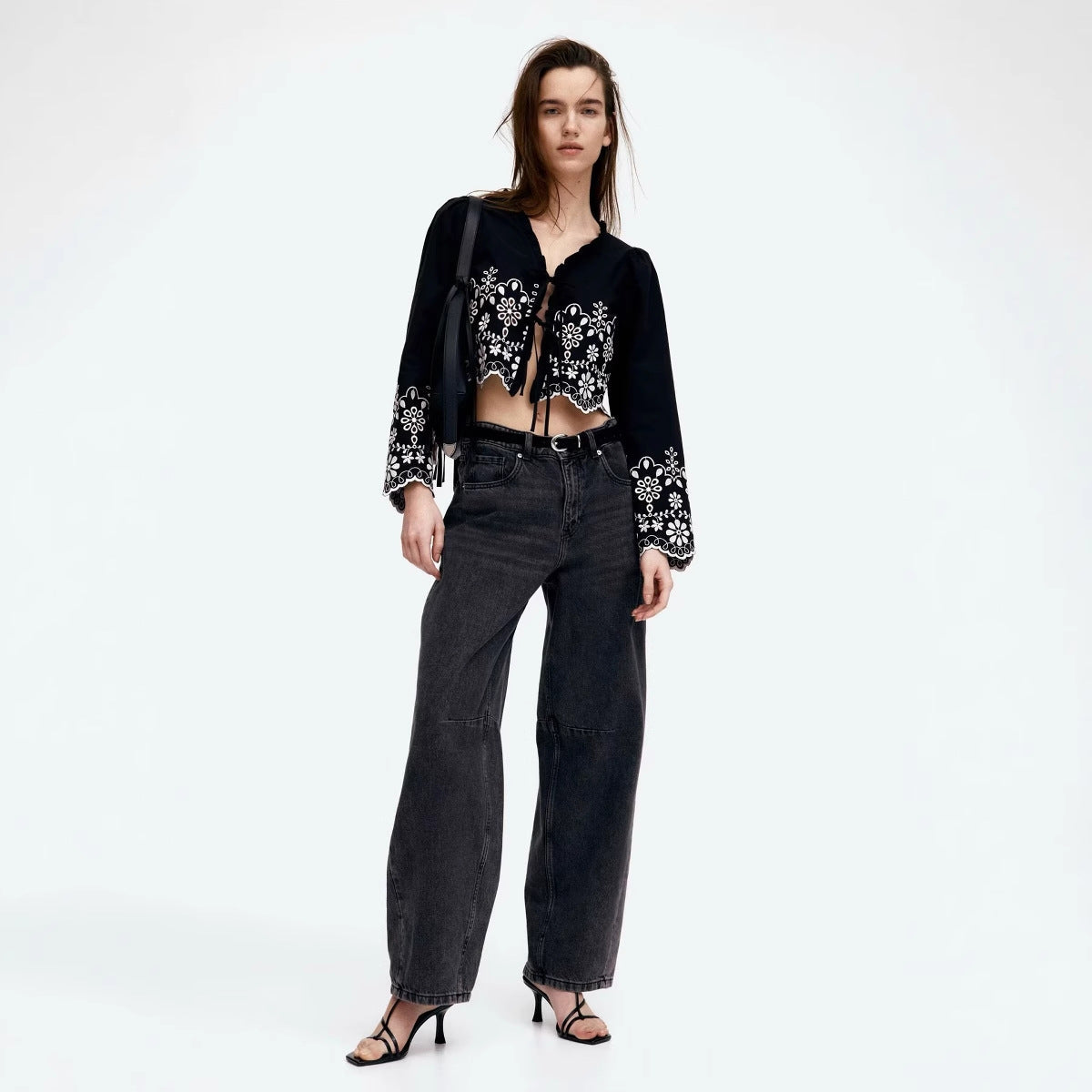 Elegant Blouse with Floral Embroidery and Ruffles