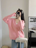 Women's Chunky Knit Cardigan with Deep V-Neck and Large Button Details