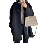 Elegant Oversized Wool Coat with Double-Button Closure and Side Pockets