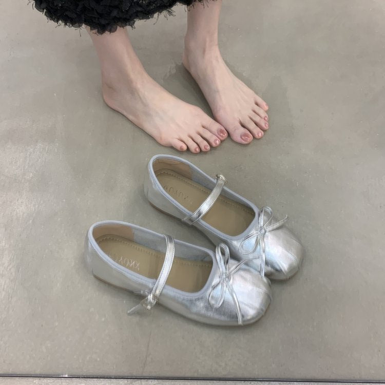 Women's ballet flats with decorative strap and comfortable footbed