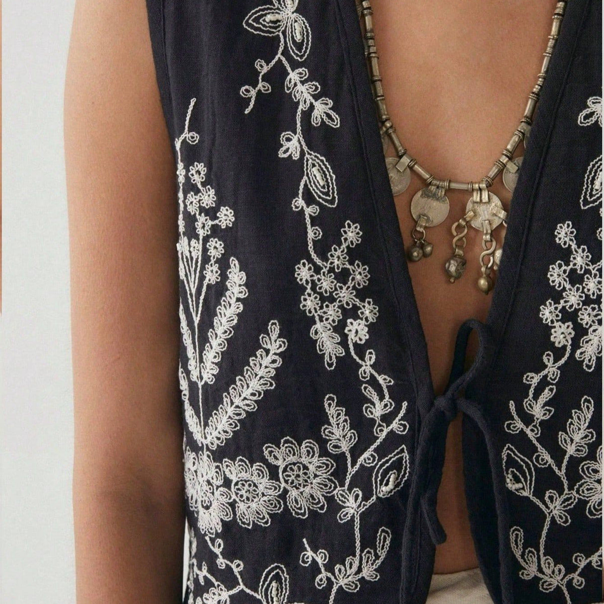 Elegant Embroidered Vest with Open Cut and Side Tie Details