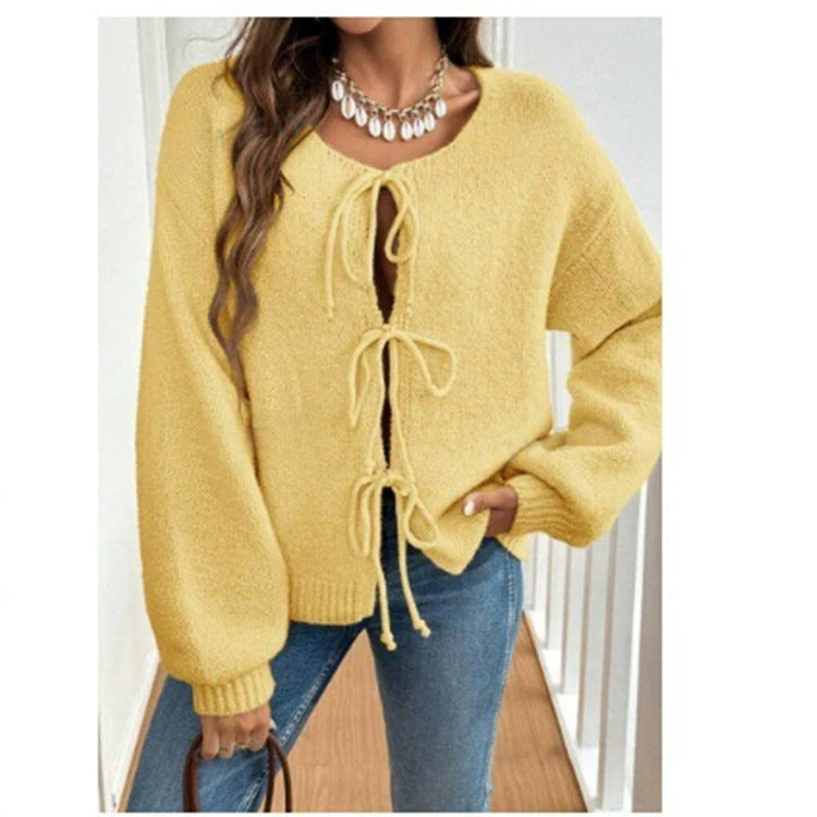 Women's Cozy Knit Sweater with Decorative Lace-Up Detail and Wide Sleeves