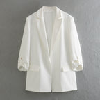 Women's Elegant Blazer with Structured Sleeves and Gold Accents