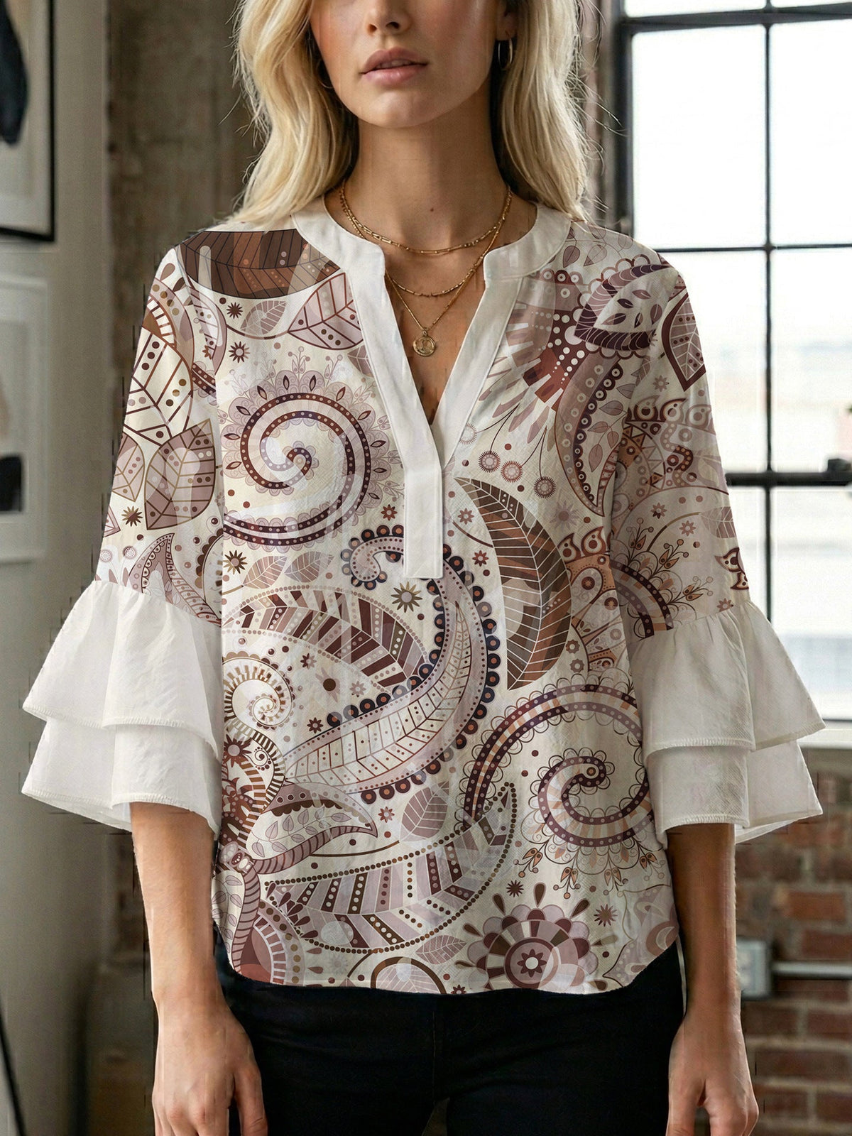 Women's Blouse with Voluminous Ruffle Sleeves and Floral Design