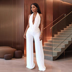 Elegant Jumpsuit with Deep Neckline and Flowing Fabric