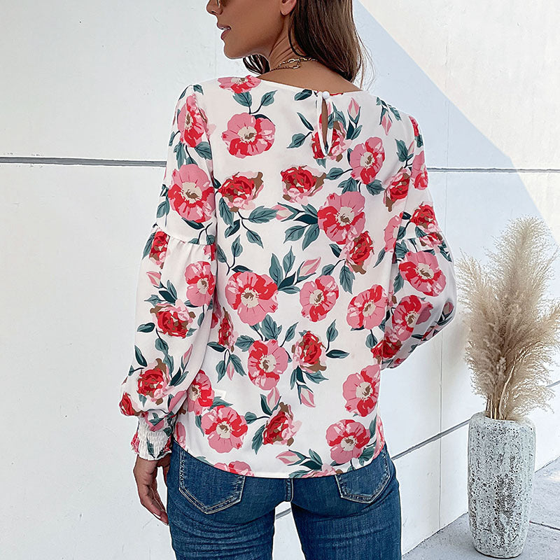 Women's Blouse with Floral Design and Voluminous Sleeves