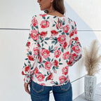 Women's Blouse with Floral Design and Voluminous Sleeves