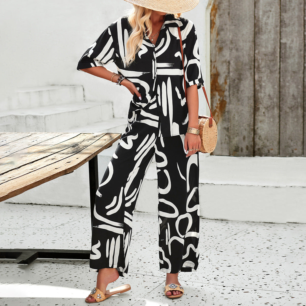 Women's Airy Two-Piece Ensemble with Floral Pattern and Wide-Leg Pants