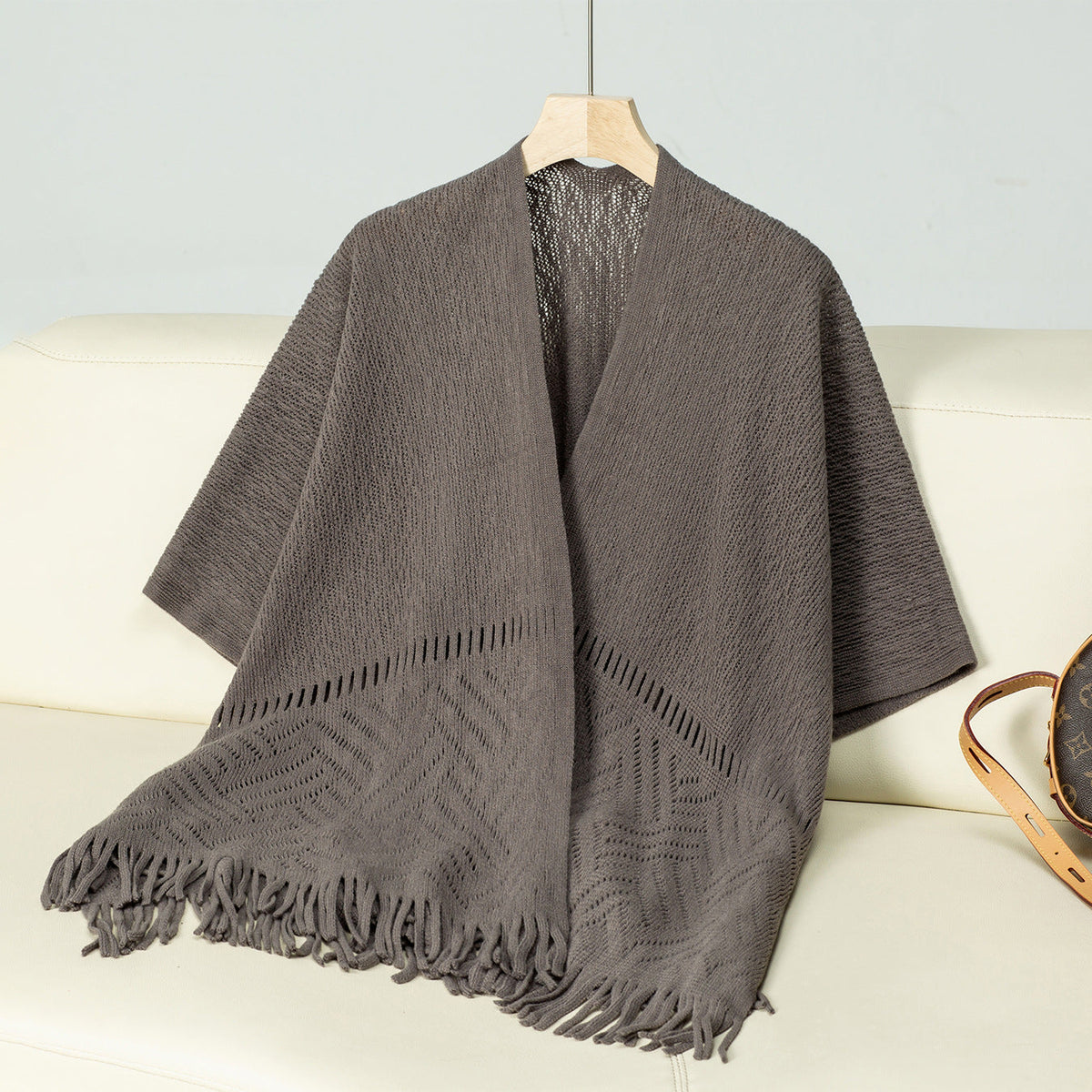Elegant Knit Poncho with Fringed Details and Pattern