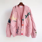 Women's Lined Knit Cardigan with Colorful Buttons and Unique Design