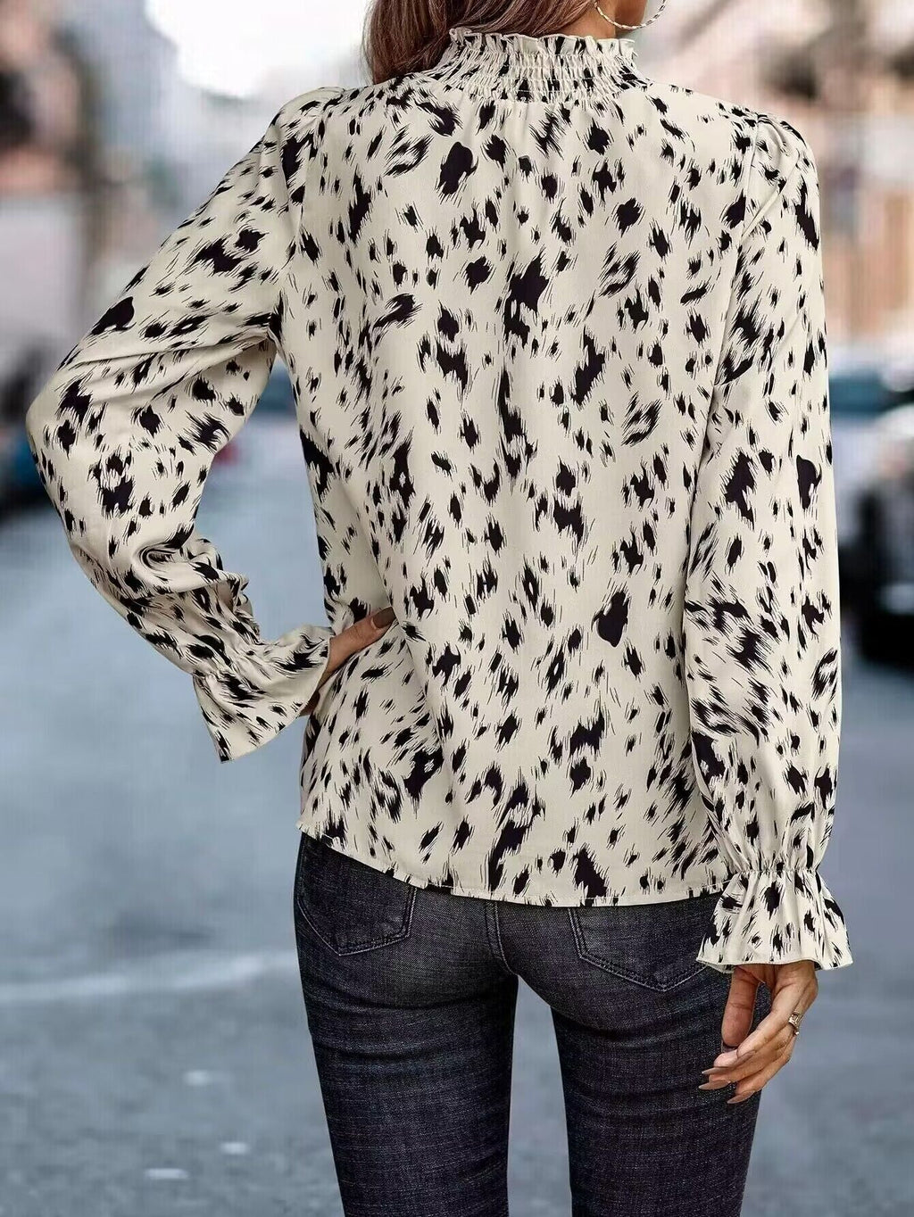 Elegant Women's Blouse with Ruffle Hem and Asymmetrical Pattern