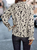 Elegant Women's Blouse with Ruffle Hem and Asymmetrical Pattern