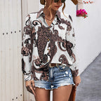 Elegant Women's Blouse with Modern Graphic Pattern and Deep Round Neckline