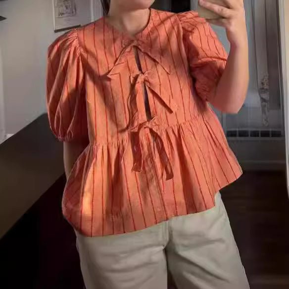 Women's Blouse with Ruffles and Bow Accents