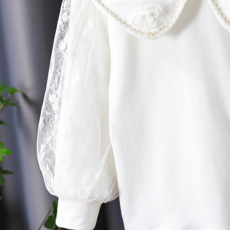 Women's Blouse with Decorative Floral Appliqués and Sheer Puff Sleeves