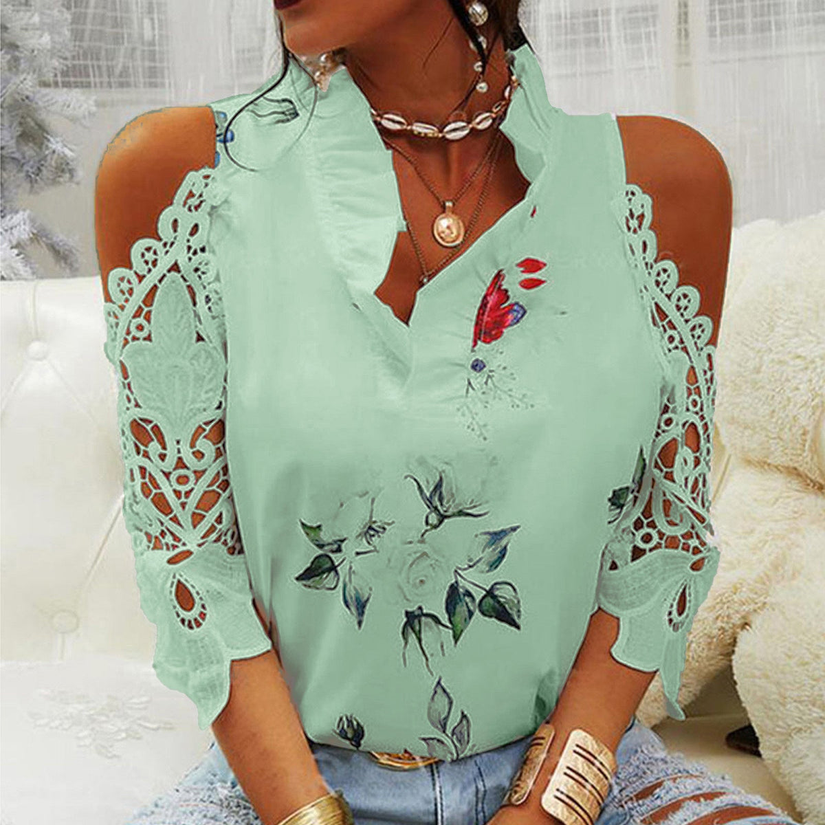 Women's Blouse with Cut-Out Sleeves and Floral Design