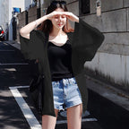 Elegant Kimono Jacket with Loose Fit and Detailed Sleeves