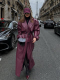 Elegant Faux Leather Jacket with Voluminous Sleeves and Waist Belt