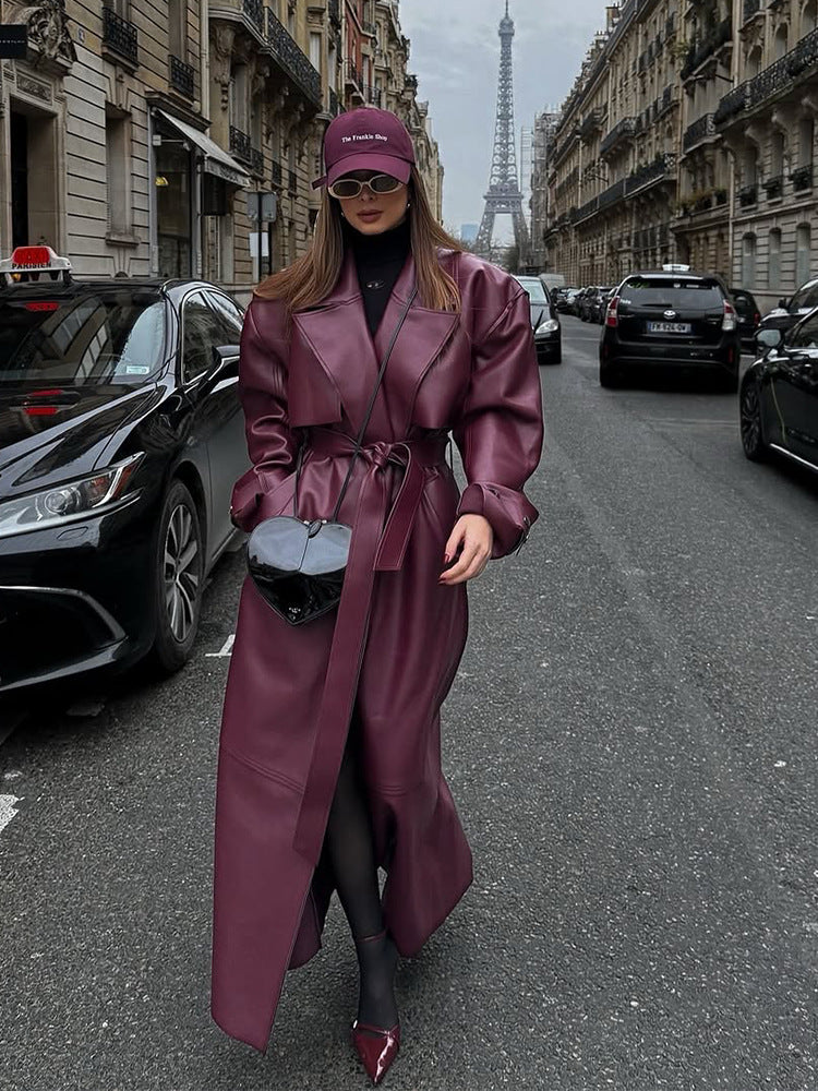 Elegant Faux Leather Jacket with Voluminous Sleeves and Waist Belt