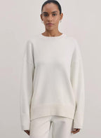 Women's Comfortable and Elegant Knit Sweater with Dropped Shoulders and Ribbed Cuffs