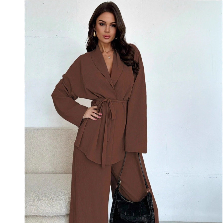 Elegant Women's Oversized Jumpsuit with Waist Belt and Wide Leg