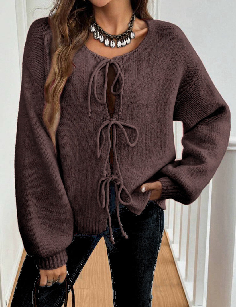Women's Cozy Knit Sweater with Decorative Lace-Up Detail and Wide Sleeves