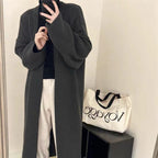 Women's Minimalist Long Wool Coat with Wide Cut and Elegant Details