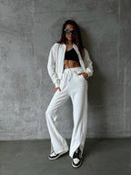 Women’s loungewear set with short zip jacket and high-waisted jogging pants with side split