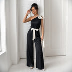 Elegant Women's Jumpsuit with Asymmetric Neckline and Decorative Waist Belt