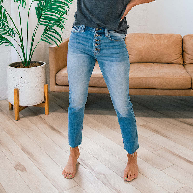 Women's High-Waist Jeans with Button Detail and Frayed Hem