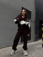 Women's athleisure two-piece made of heavy neoprene fleece with geometric dividing seams and high waist