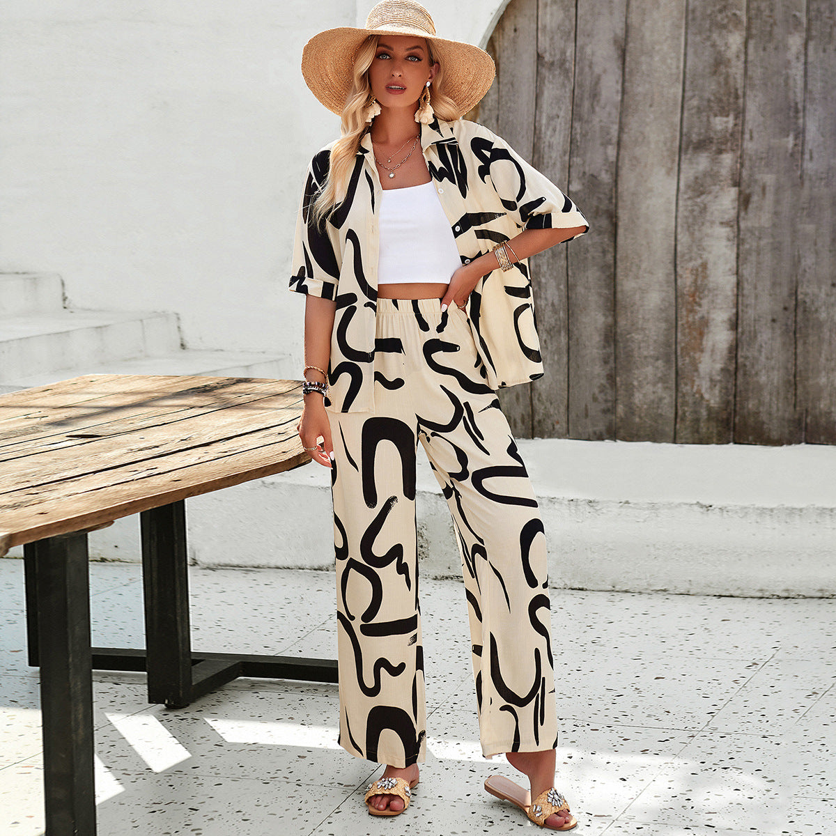 Women's Airy Two-Piece Ensemble with Floral Pattern and Wide-Leg Pants