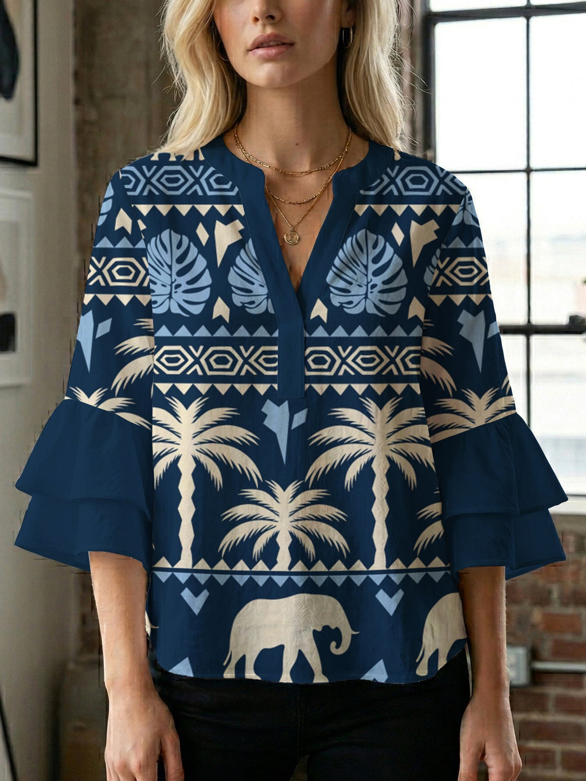 Women's Blouse with Voluminous Ruffle Sleeves and Modern Print