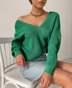 Elegant V-Neck Sweater with Fine Ribbed Texture and Drop Shoulders