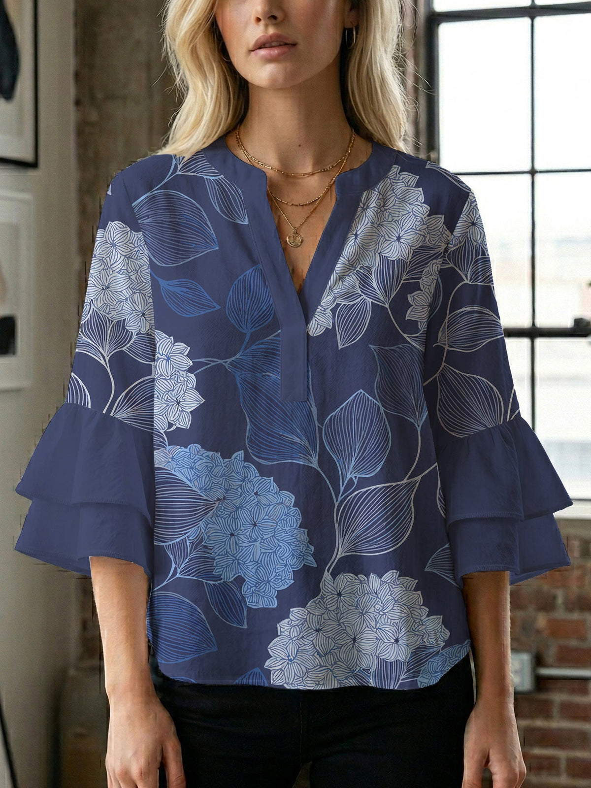 Women's Blouse with Voluminous Sleeves and Floral Design