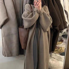 Women's Minimalist Long Wool Coat with Wide Cut and Elegant Details