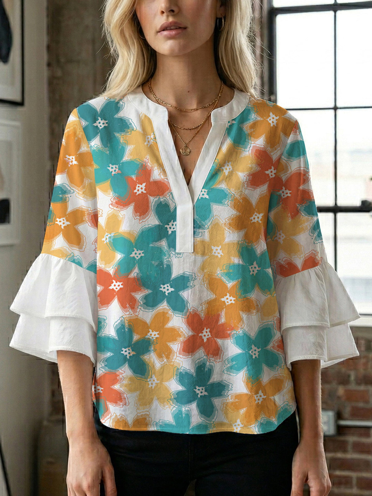 Women's Blouse with Voluminous Sleeves and Floral Design