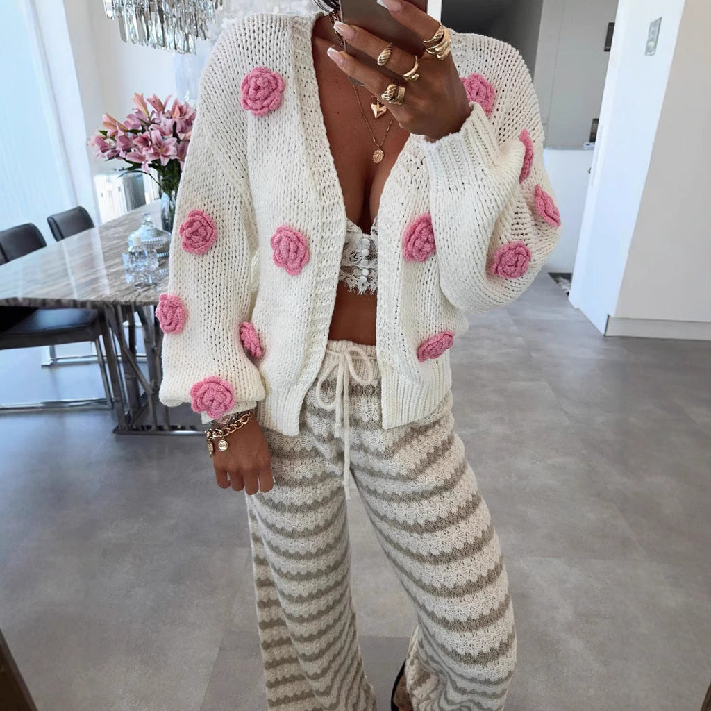 Women's Cozy Knit Cardigan with Playful Floral Appliqués