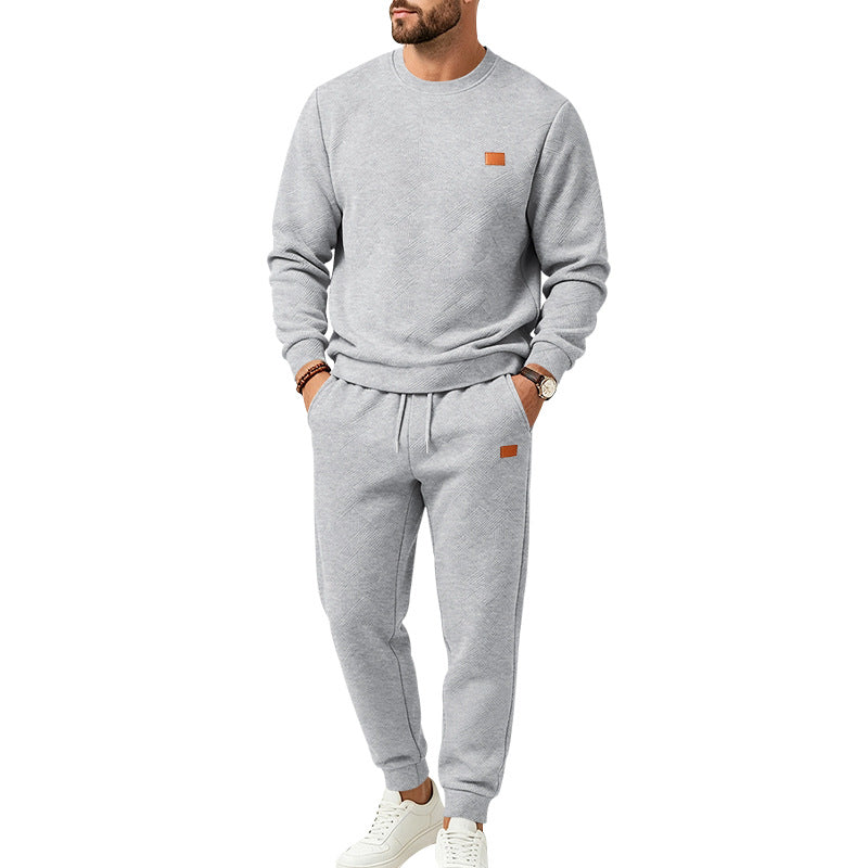 Men's leisure jogging suit made of textured fleece with round neckline and drawstring waistband