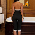 Women's Jumpsuit with Lace Trim and Plunging Neckline