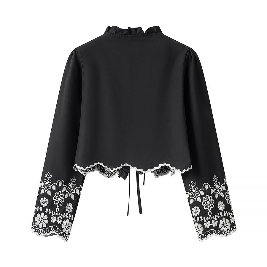 Elegant Blouse with Floral Embroidery and Ruffles