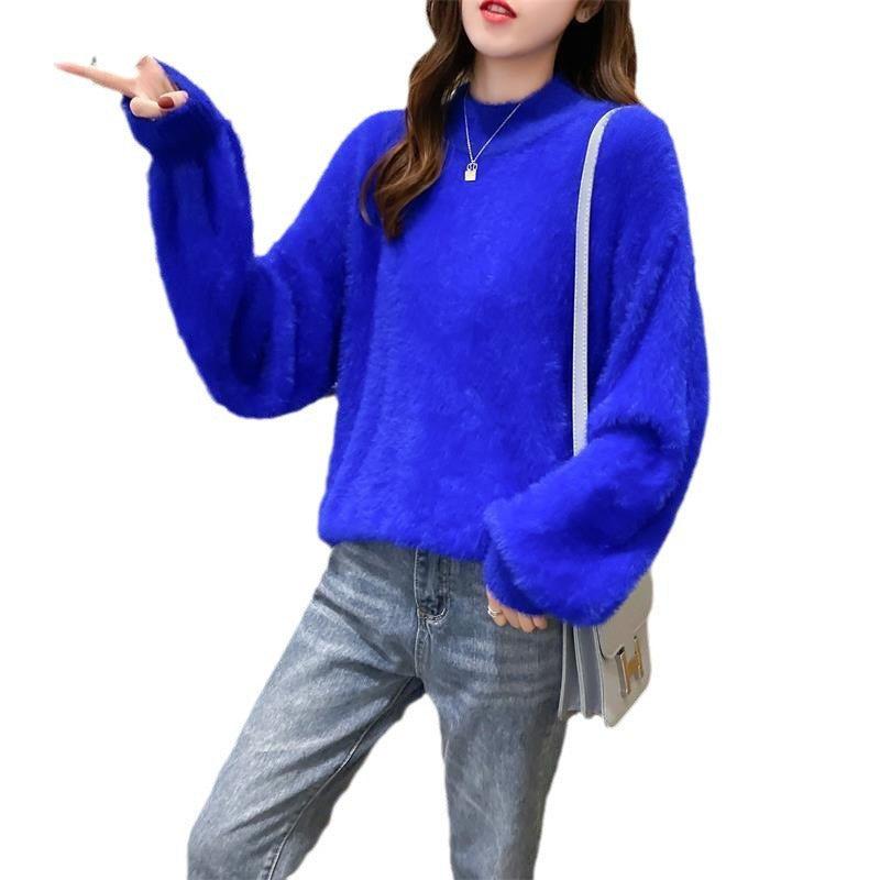 Women's fluffy turtleneck pullover with puff sleeves and textured design