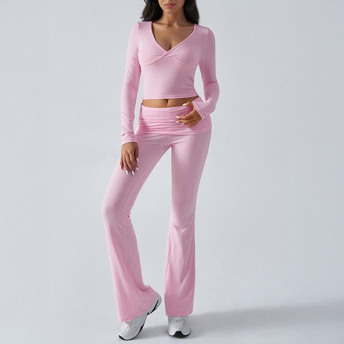 Women's form-fitting yoga set with high waist and V-neck