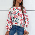 Women's Blouse with Floral Design and Voluminous Sleeves